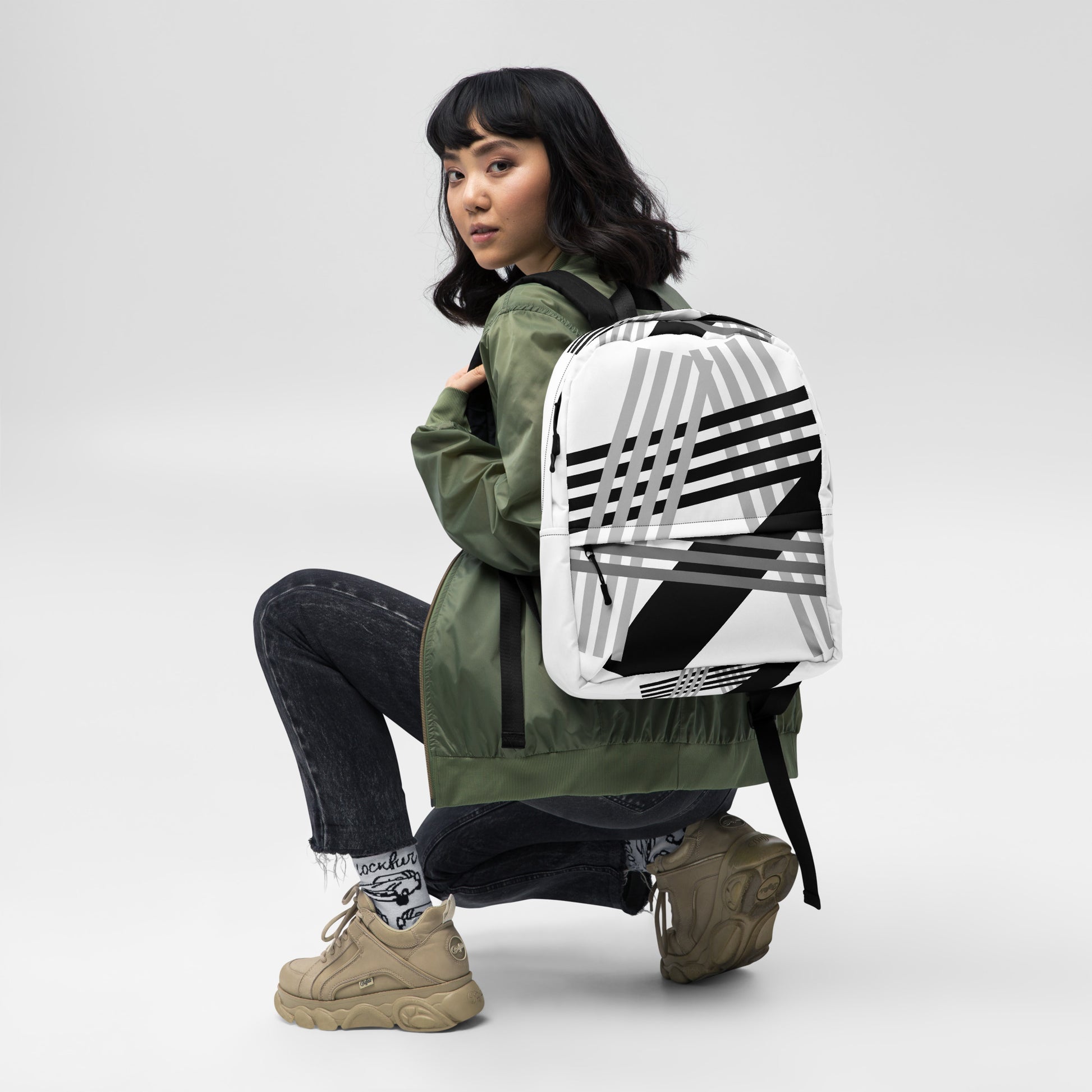 Stride stripes Backpack - LUDE fashion, streetwear, unique designs, custom apparel, gift ideas, trendy, eco-friendly, statement pieces, graphic tees, sustainable fashion, minimalist, pop culture, creative prints, bold designs, limited edition, casual wear, artistic, lifestyle