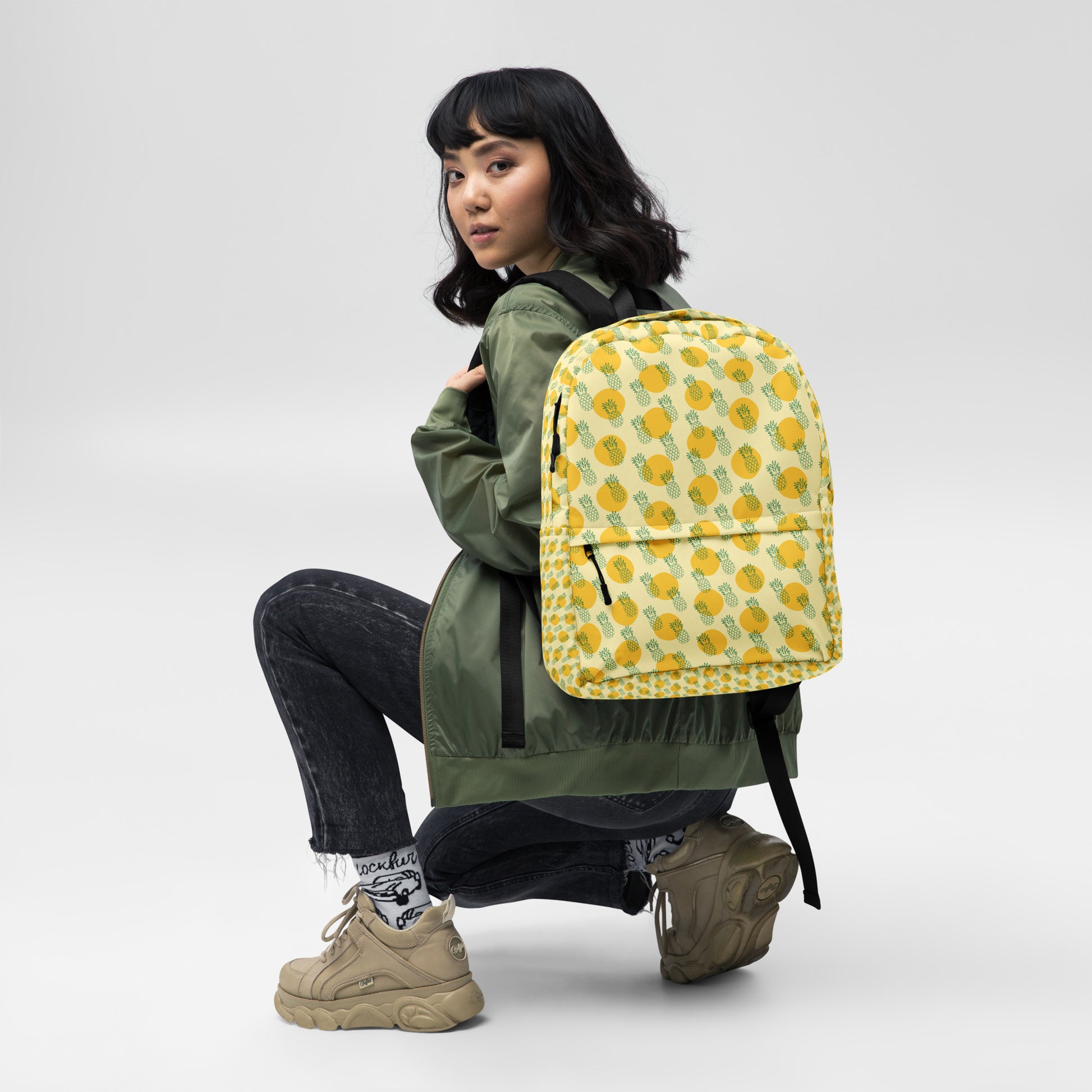 Pineapple pop Backpack - LUDE fashion, streetwear, unique designs, custom apparel, gift ideas, trendy, eco-friendly, statement pieces, graphic tees, sustainable fashion, minimalist, pop culture, creative prints, bold designs, limited edition, casual wear, artistic, lifestyle